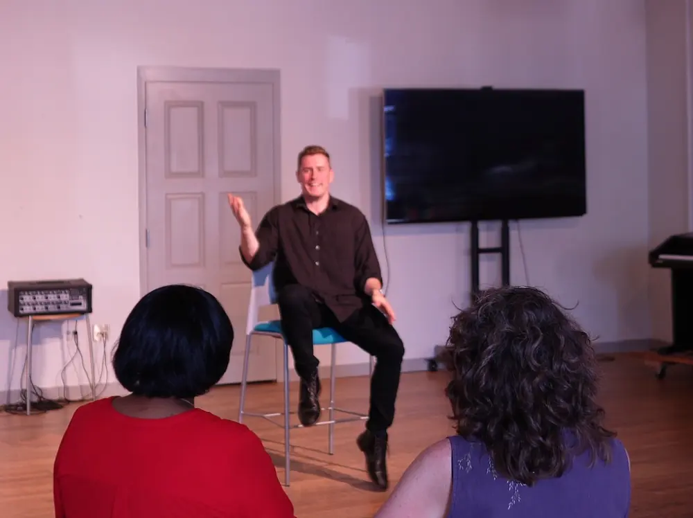 Joseph coaching a cohort in the room